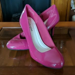 Patten leather pumps